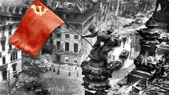 red army - Meliton-Kantaria--a-Red-Army-soldier-and-an-ethnic-Georgian--raising-a-Soviet-flag-over-the-Reichstag-in-Berlin.-30.04-416.1945.si