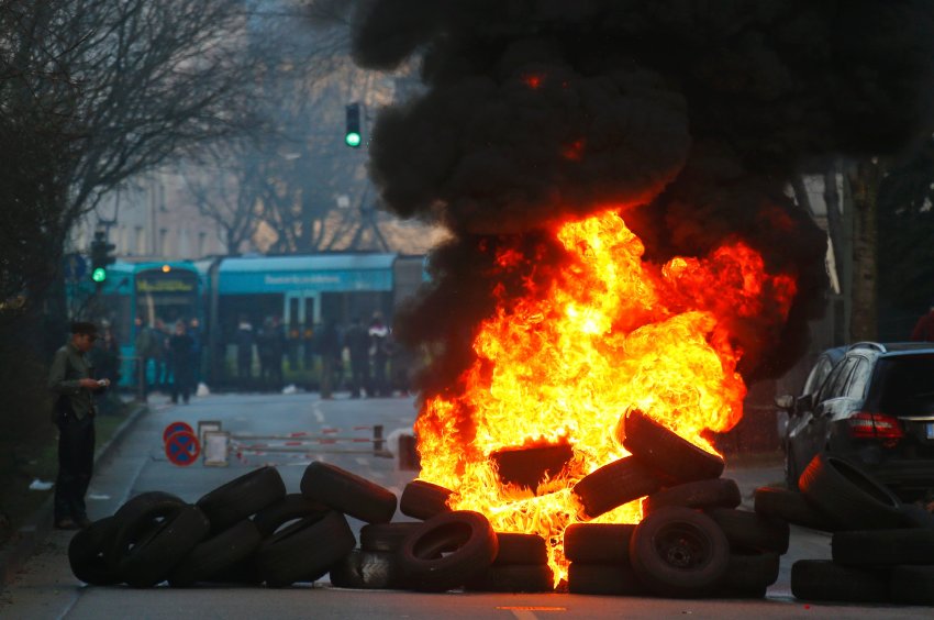 A street blockade of anti-capitalist protesters burns near the new ECB headquarters in downtown Frankfurt